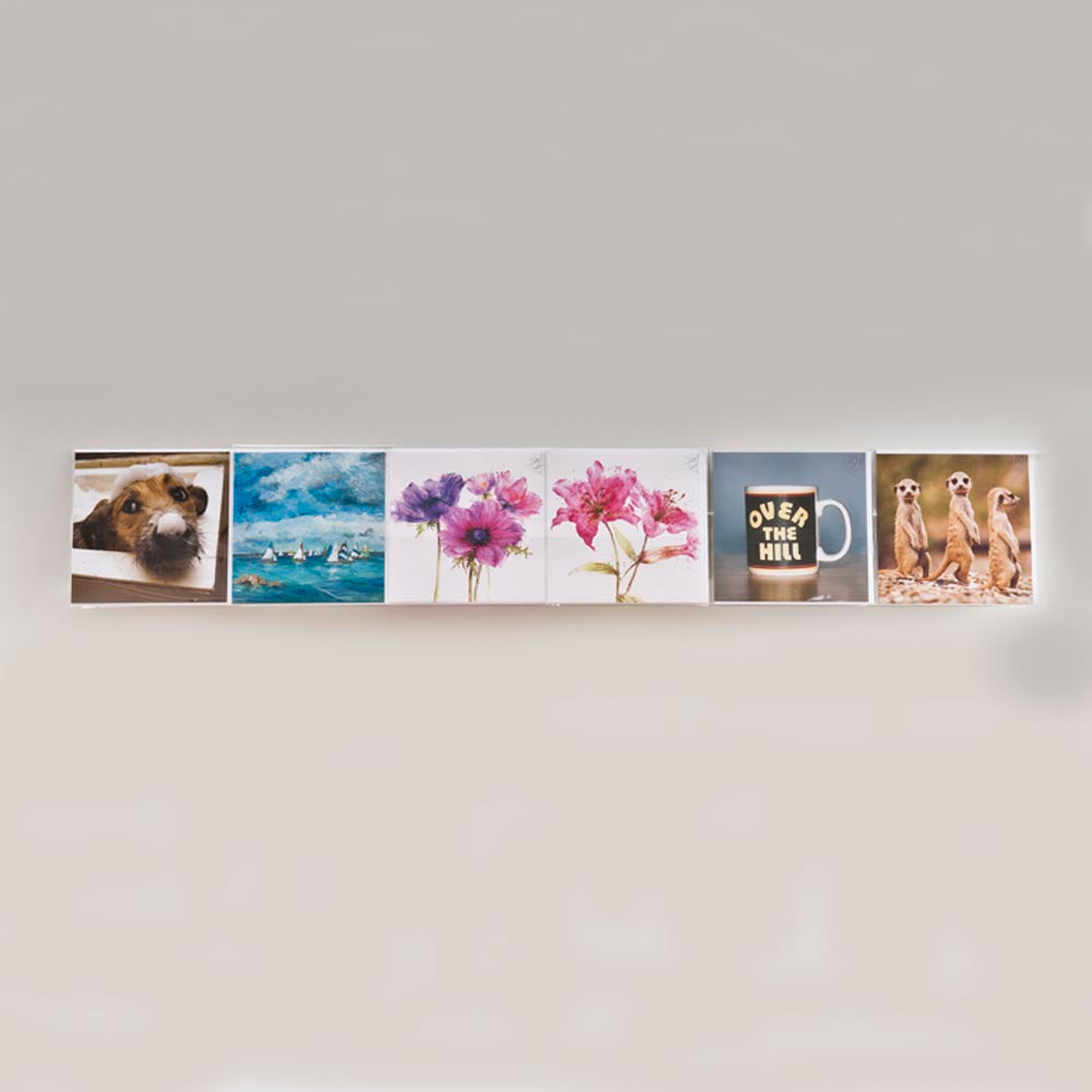 Image displaying 100cm economy greeting card rack installed on a wall.