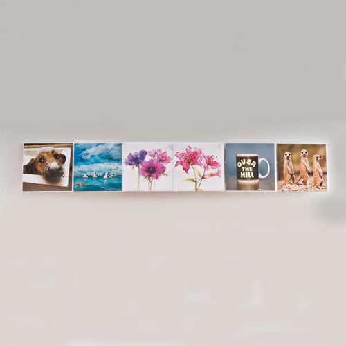 Image displaying 100cm economy greeting card rack installed on a wall.