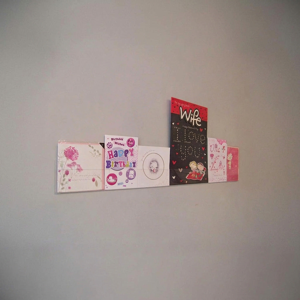 Image displaying 94cm single greeting card (0.5cm capacity) rack installed on wall.
