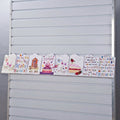 Image displaying 100cm standard greeting card rack installed on a white slatwall.