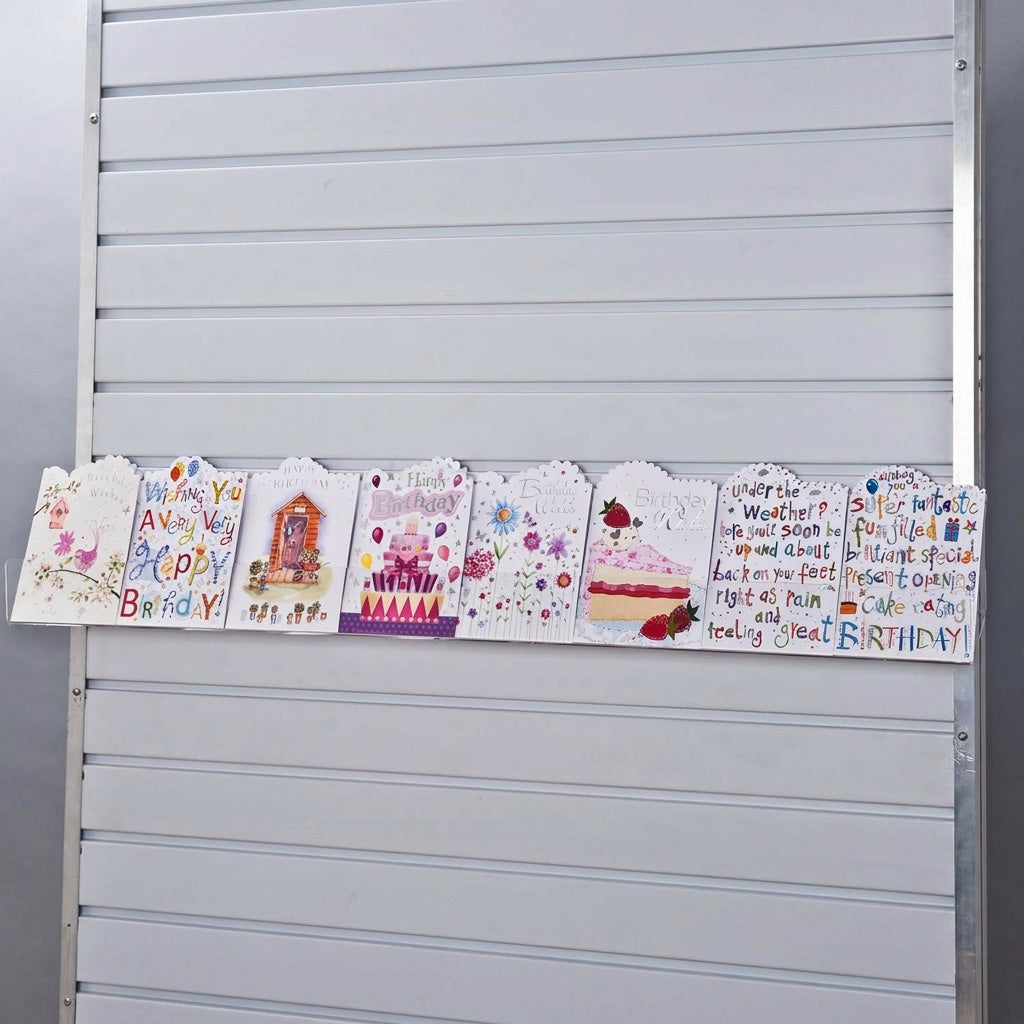 Image displaying 100cm standard greeting card rack installed on a white slatwall.