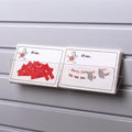 Image displaying 30cm standard greeting card rack installed on a white slatwall.