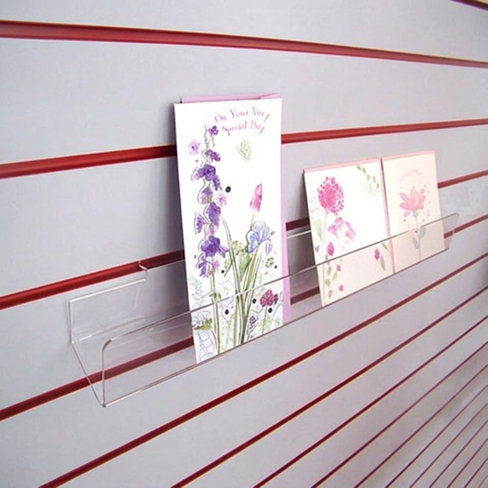 Image displaying 60cm standard greeting card rack installed on a grey slatwall.