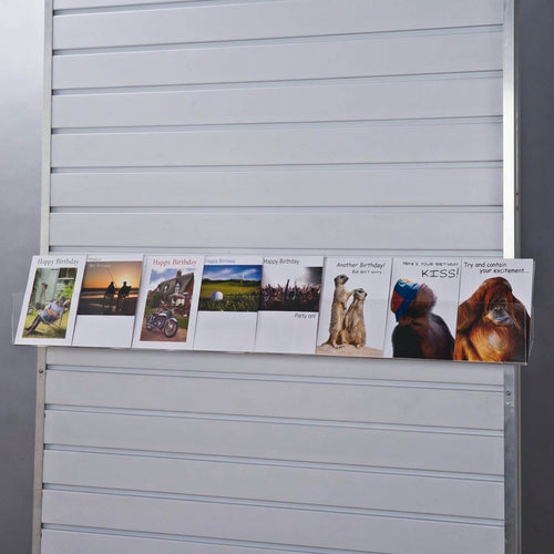 Image displaying 100cm deep greeting card rack installed on a white slatwall.