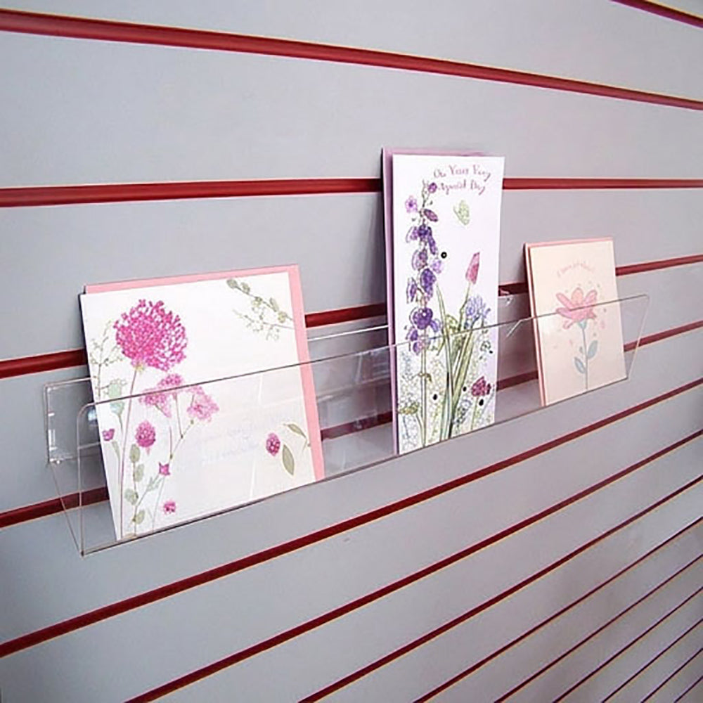 Image displaying 60cm deep greeting card rack installed on a white slatwall.