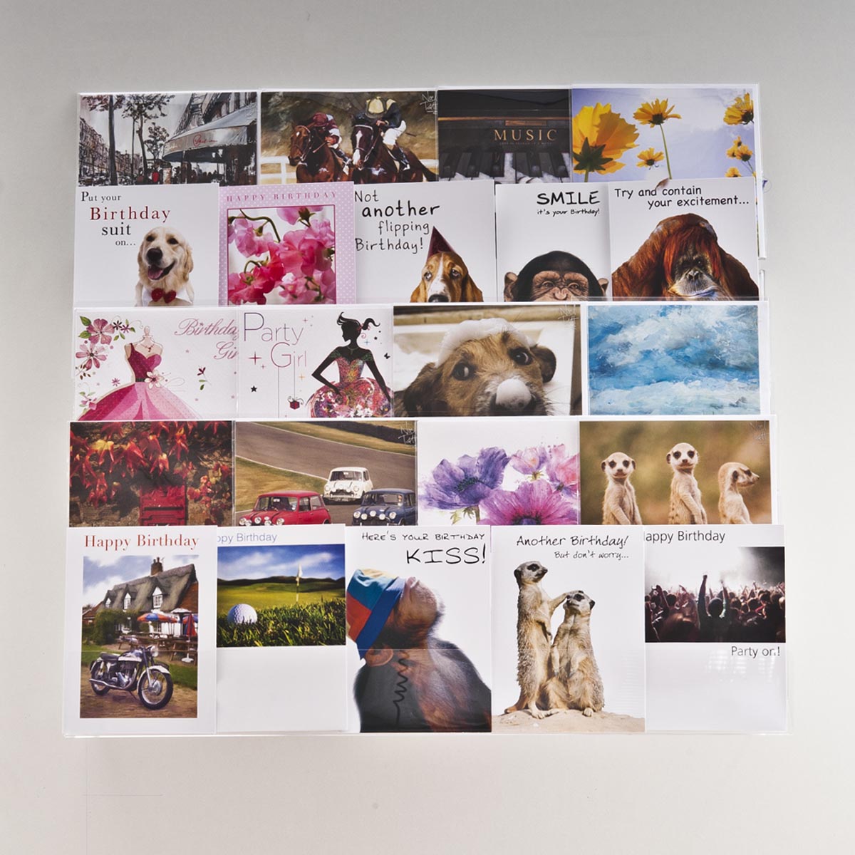 Image displaying 5 tier 60cm greeting card rack wall fixing installed on wall. 