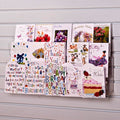 Image displaying 3 tier 60cm greeting card rack installed on white slatwall. 