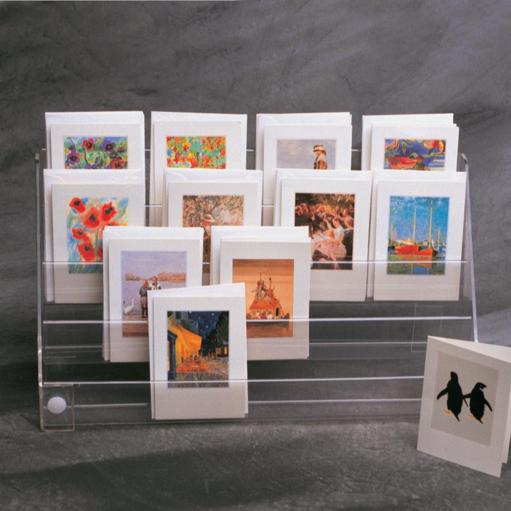 Image displaying 4 tier mini greeting card display on a counter.