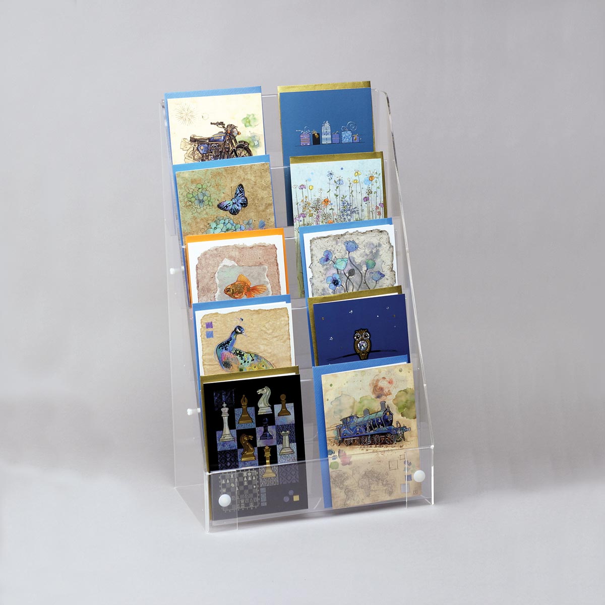 Image displaying 5 tier greeting card display on a counter.
